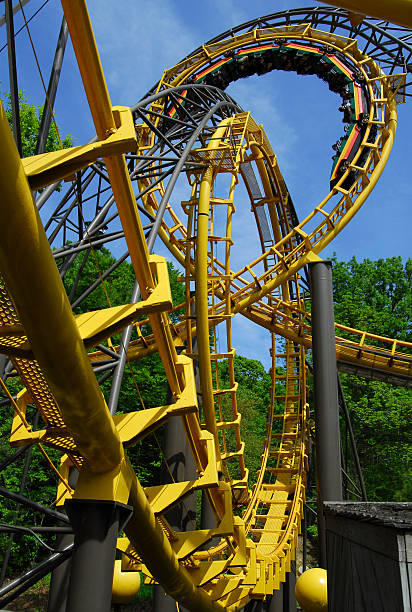 Loop de Loope Loch Ness Monster rollercoaster train speeds through one of its interlocked loopsSee other amusement park images in my portfolio: williamsburg virginia stock pictures, royalty-free photos & images