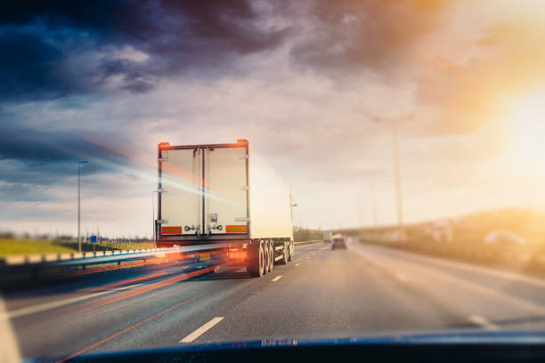 Lorry on a motorway in motion stock photo