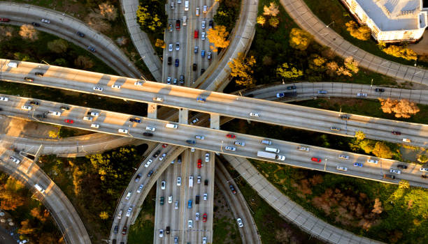 Los Angeles Four Level Freeway Interchange Helicopter Aerial View of the famous Los Angeles Four Level freeway interchange traffic stock pictures, royalty-free photos & images
