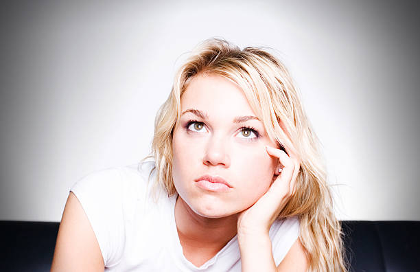 Lost In Thought Beautiful Young Adult Blonde Woman hf7 stock pictures, royalty-free photos & images