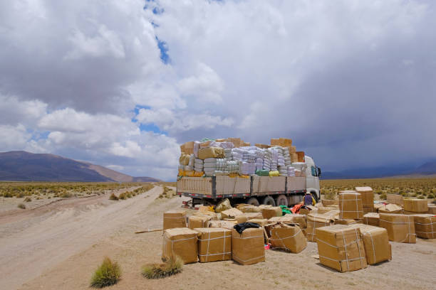 Lost truck load, the load spilled across the gravel road in the high andes mountains of northern Chile stock photo