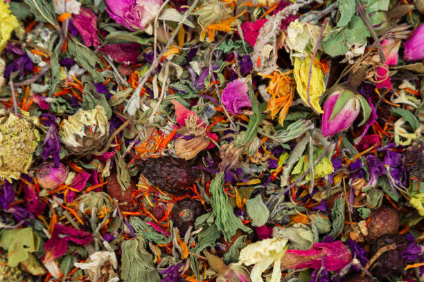 A lot of dried flowers for tea to add. Antioxidant natural herb mix. stock photo