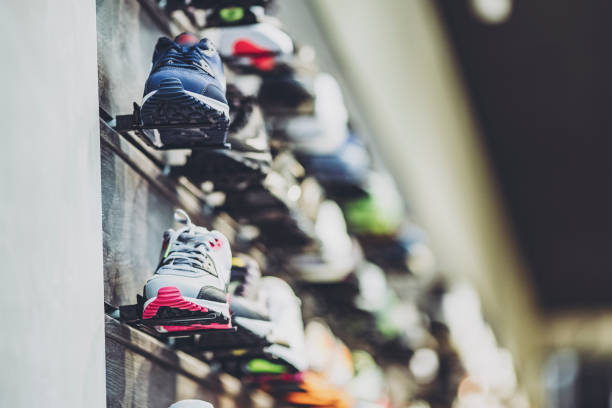 A lot of sneaker shops lined up A lot of sneaker shops lined up sports shoe stock pictures, royalty-free photos & images
