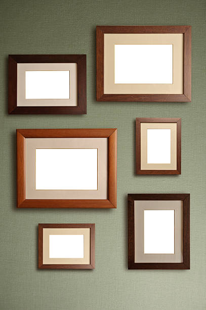 lots of frames on the wall  dresser photos stock pictures, royalty-free photos & images