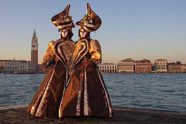 Love - Couple in Venetian Masks - Venice Carniva stock photo