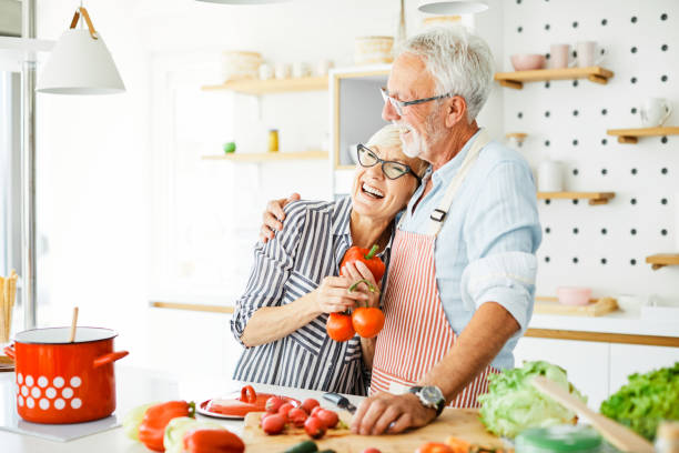love kitchen senior woman man couple home retirement happy food smiling husband wife together person stock photo