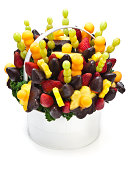 istock Lovely tropical fruit bouquet arrangement in a white basket 166610697