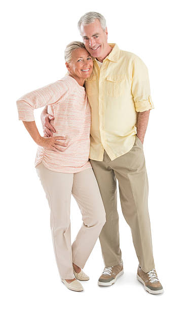 Loving Senior Couple Against White Background stock photo