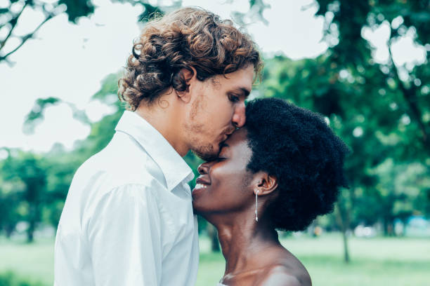 White man making love to a black woman
