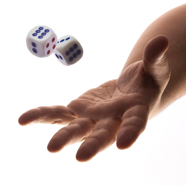 Throwing Dice Stock Photos, Pictures & Royalty-Free Images 