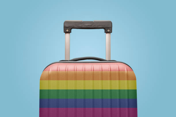 Luggage with gay pride flag vacation concept stock photo