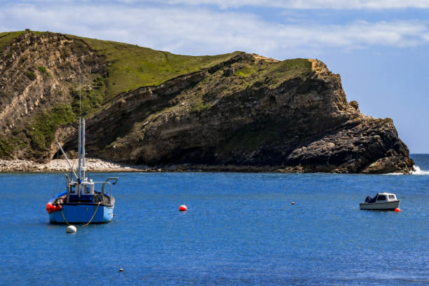 lulworth cove jurassic coast world heritage site dorset lulworth cove jurassic coast world heritage site dorset isle of purbeck jurassic world stock pictures, royalty-free photos & images