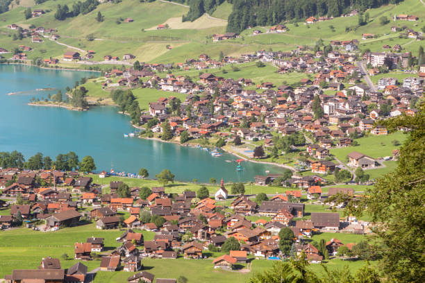 Lungern village, Switzerland Lungern village  at Brunigpass, Switzerland lungern village switzerland lake stock pictures, royalty-free photos & images