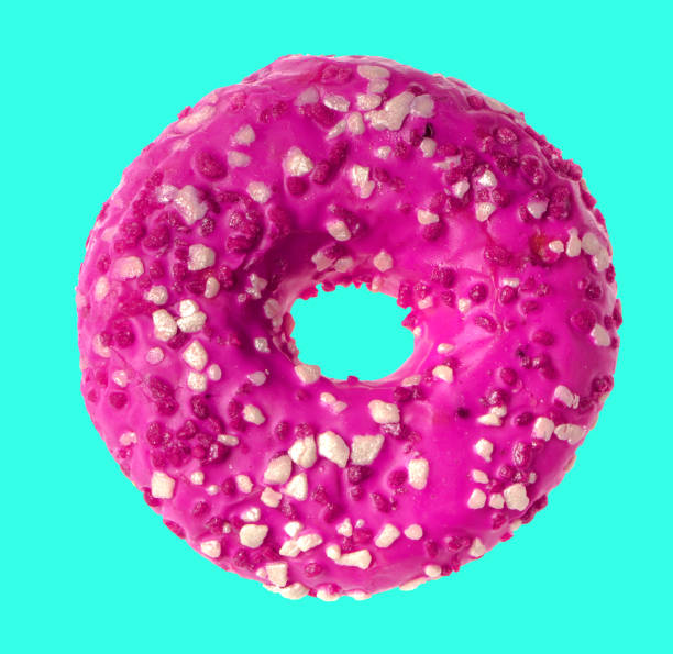 lush donut covered with cream, on a blue background stock photo