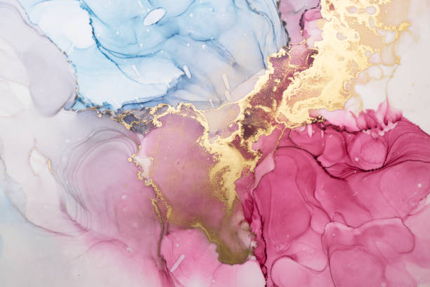 Luxury colorful abstract background in alcohol ink technique, golden liquid painting marble texture, scattered acrylic blobs and swirling stains, printed materials stock photo