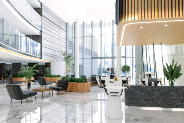 luxe hotel lobby met slimme robots werken als receptioniste en ober. - lobby stockfoto's en -beelden
