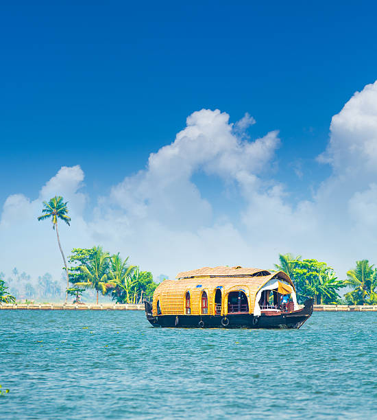 Luxury Houseboat in India Houseboat on Kerala backwaters - India kerala stock pictures, royalty-free photos & images