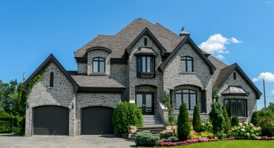 Luxury Suburban House Exterior In Summer Stock Photo Luxury Suburban House Exterior In Summer Stock Photo