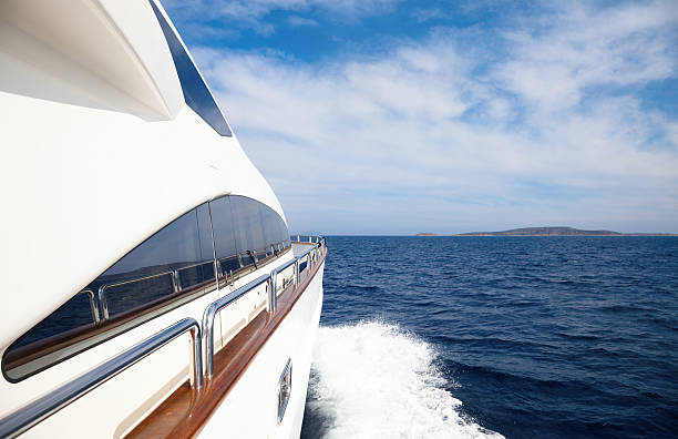 Luxury yacht sailing in the ocean stock photo