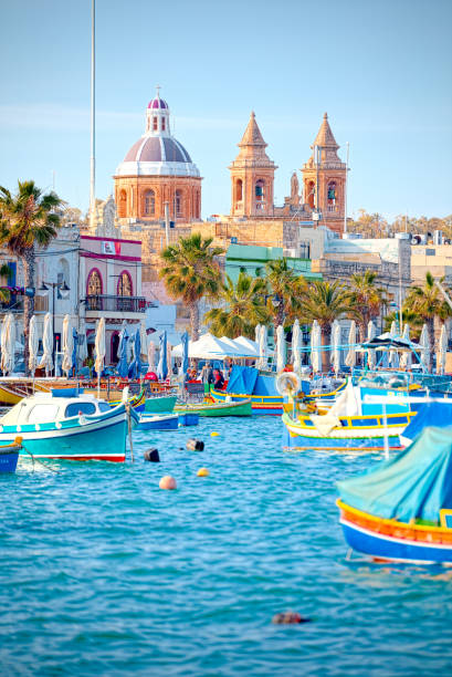 Luzzu anchored in Malta, at the port of Marsaxlokk stock photo