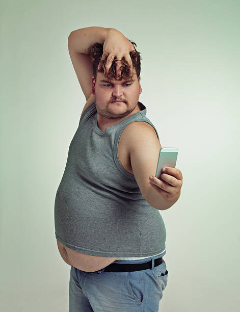 346 Funny Fat Guy With The Phone Stock Photos, Pictures &amp; Royalty-Free  Images - iStock