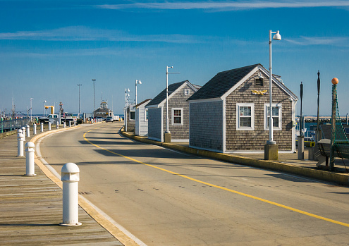 Shacks along MacMillan Pier in Provincetown, Massachusetts offer fishing and whale watching trips in Cape Cod Bay  in this seaside village at the very tip of Cape Cod