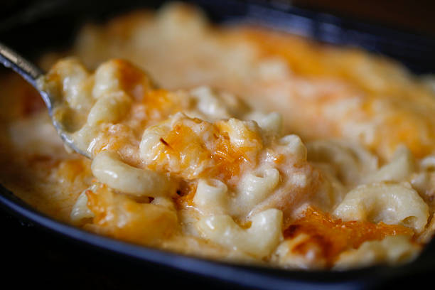 Macaroni and Cheese macaroni and cheese. shallow depth of field comfort food stock pictures, royalty-free photos & images