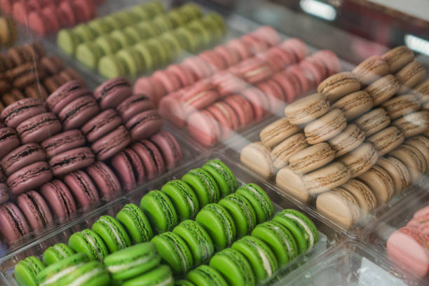 macaroons in display case stock photo