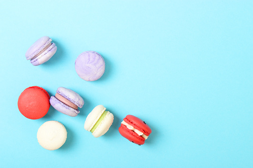 macaroons on a colored background top view. High quality photo