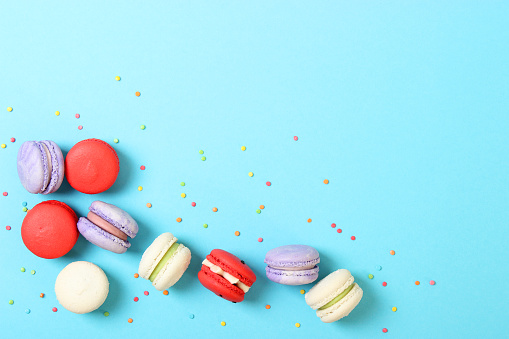 macaroons on a colored background top view. High quality photo
