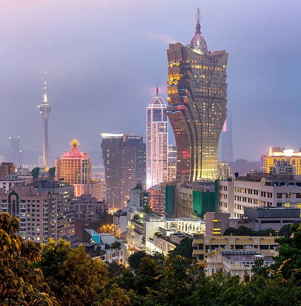 Macau cityscape night Macau cityscape skyline at dusk. Mocau now is part of China. cotai strip stock pictures, royalty-free photos & images