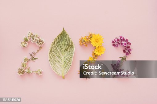 istock 2022 made from natural plants, leaves and flowers, Happy New Year wellness and healthy lifestyle resolutions, holidays retreat concept 1345411026