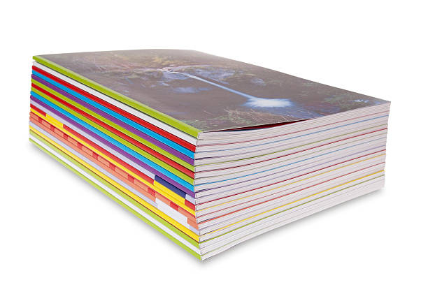 magazine stack stack of colorful magazines on white with drop shadow magazine publication stock pictures, royalty-free photos & images