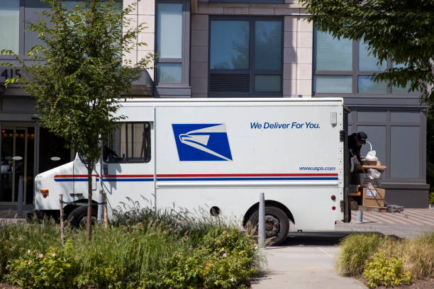US mail delivery truck stock photo