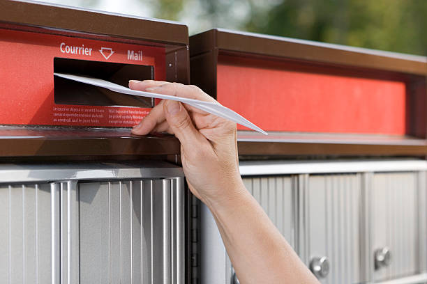 Mailing a letter stock photo