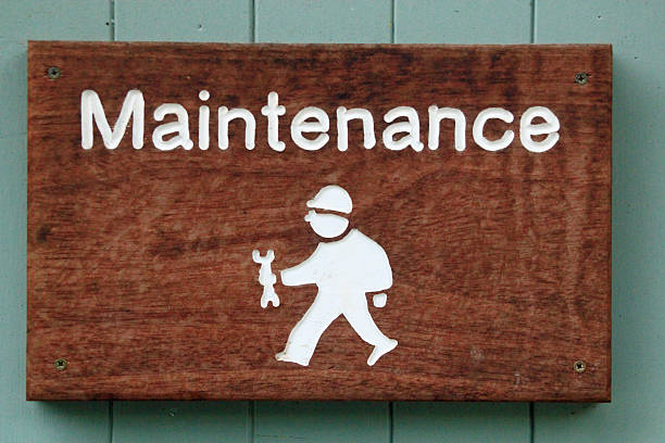 Sign for maintenance showing character man with a spanner symbolizing...