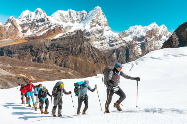 Majestic Nepal Nature View and Mountaineering Expedition walking on Snow stock photo