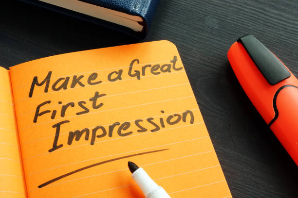 Make a great first impression handwritten in the note. Make a great first impression handwritten in the note. imitation stock pictures, royalty-free photos & images