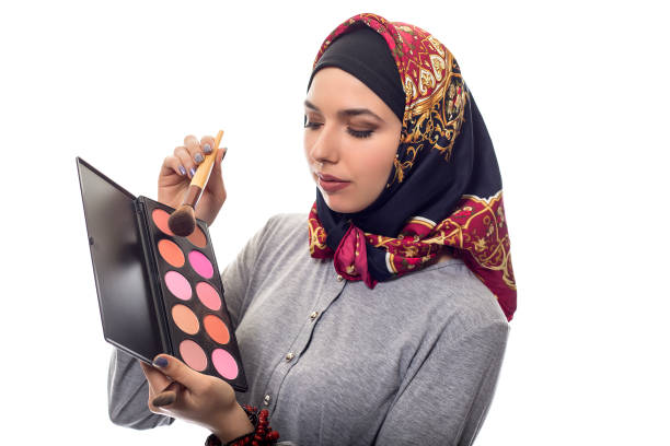 Make Up Artist in Conservative Hijab stock photo