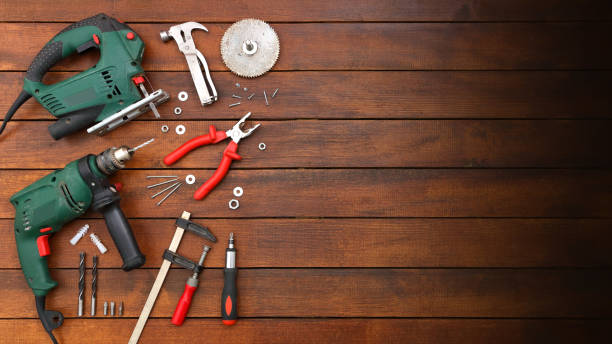 DIY Maker Background with Hand Tools on Wood Table stock photo