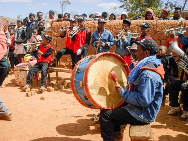 Malagasy traditional musicians playing folk music during the rite of "famadihana" (exhumation) in the highlands stock photo