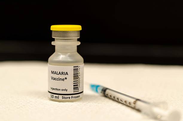 Malaria vaccine Fictitious malaria vaccine malaria parasite stock pictures, royalty-free photos & images