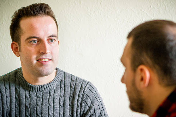 Male Life Coach talking with his Client stock photo
