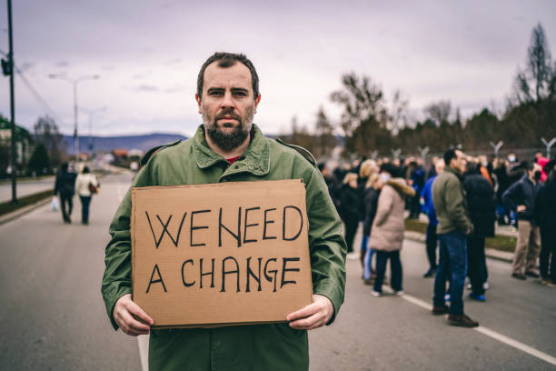 Male protester in the street stock photo