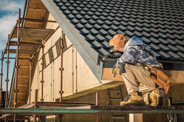 Male Roof Contractor Reviews Project Progress. stock photo