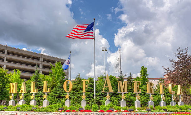 Mall of America Entrance Sign Bloomington, United States - June 23, 2014: The entrance to the Mall of America. The Mall of America (MoA) is a shopping mall owned by the Triple Five Group. mall of america stock pictures, royalty-free photos & images