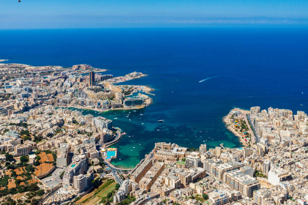 Malta aerial view. St. Julian's or San Giljan, and Tas-Sliema cities. St. Julian's bay, Balluta bay, Spinola bay, Towns, harbours and coastline of Malta from above. Skyscraper in Paceville district stock photo