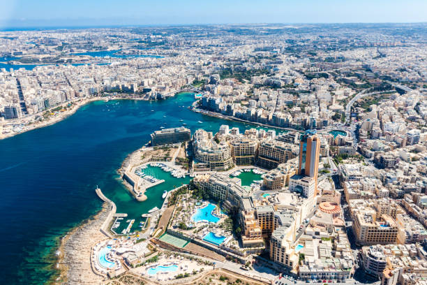 Malta aerial view. St. Julian's, San Giljan and Tas-Sliema cities. St. Julian's bay, Balluta bay, Spinola bay, Towns, harbours and coastline of Malta from above. Skyscraper in Paceville district stock photo