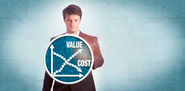 Man Analyzing Value Growth Versus Cost Reduction stock photo