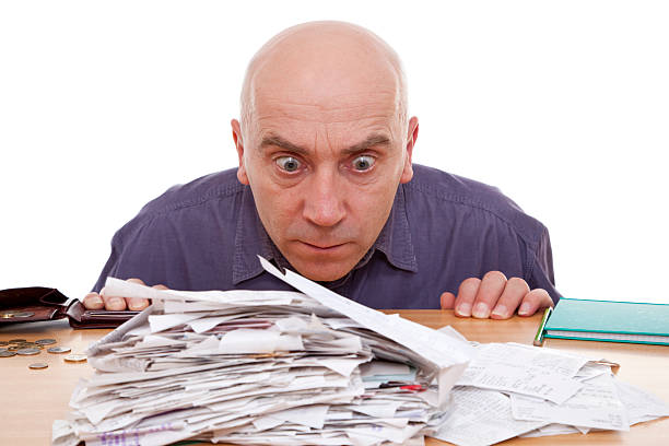 man and receipts stock photo